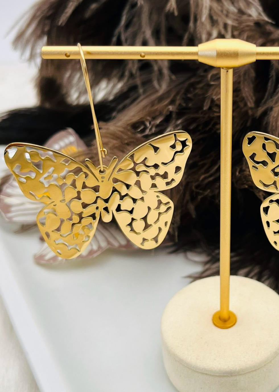 Aretes en Stainles Steel de Mariposas en Color Doradas