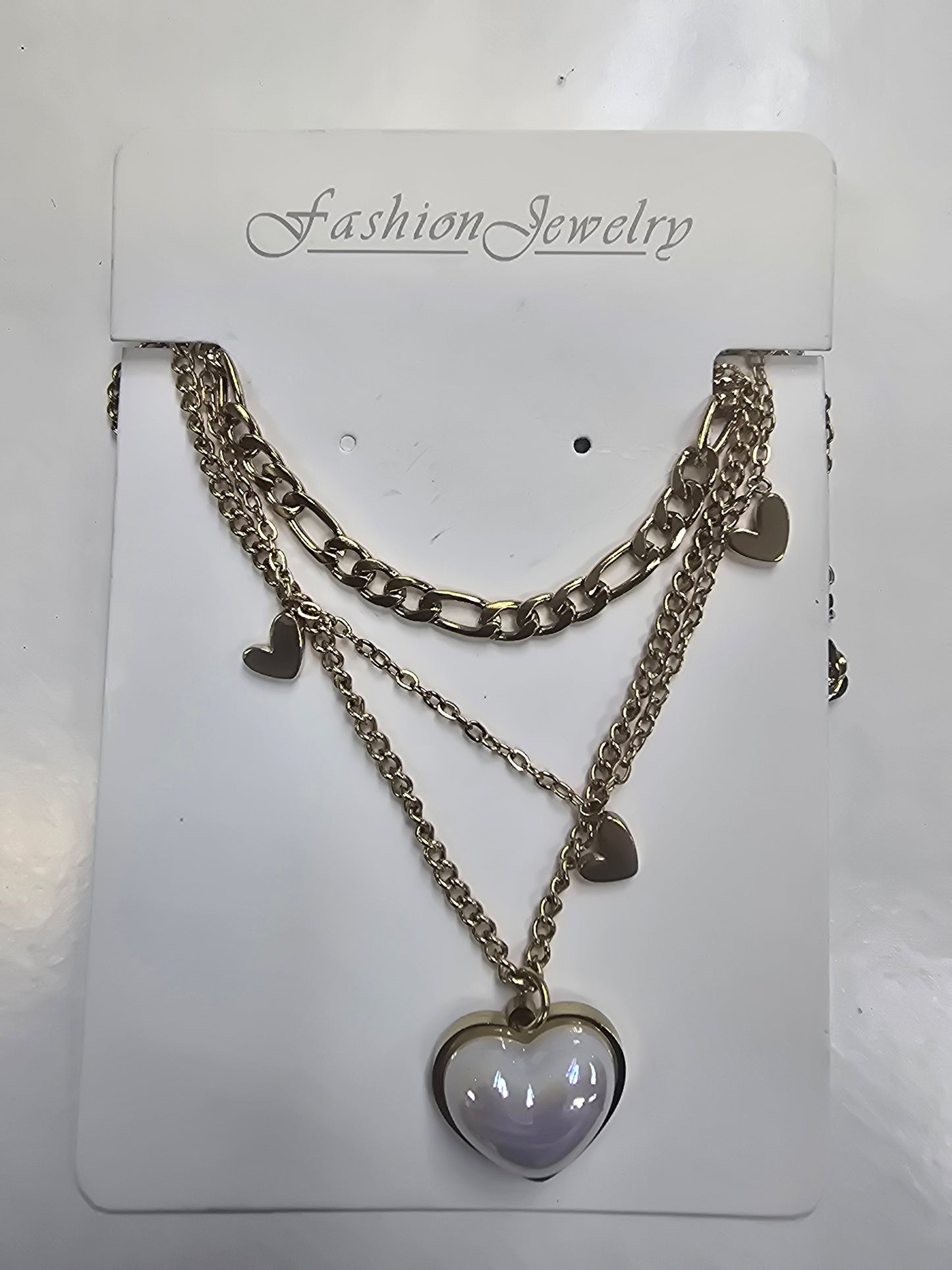 Collar tres cadenas con pendant de corazon