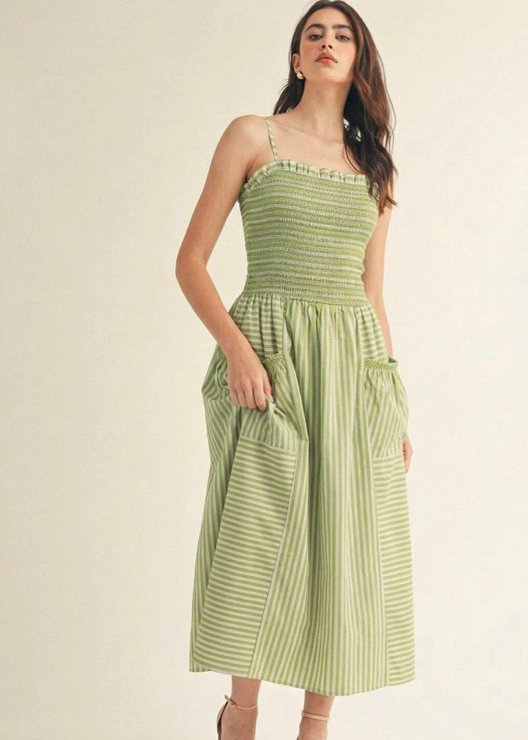 SLEEVELESS SQUARE NECK
SMOCK POCKETS STRIPES
MAXI DRESS