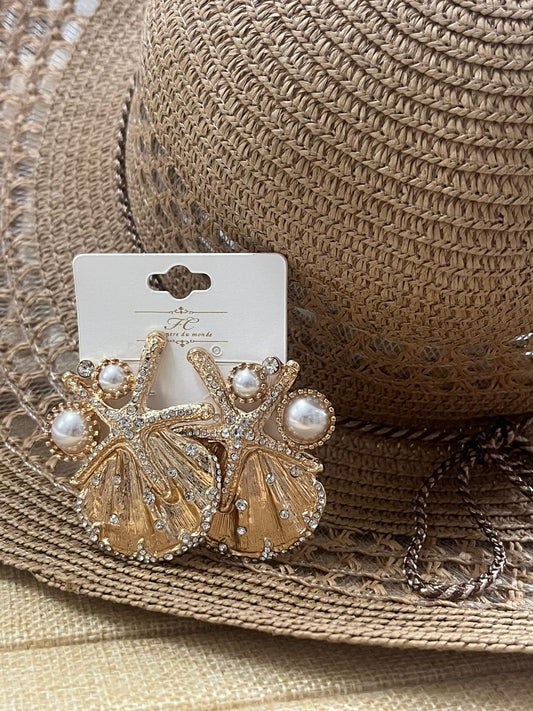 Aretes de estrellas y conchas