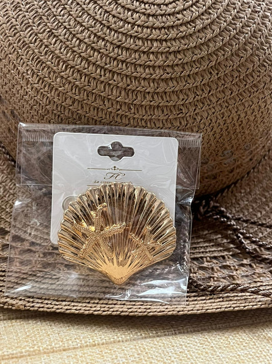 Broches de concha y estrella
