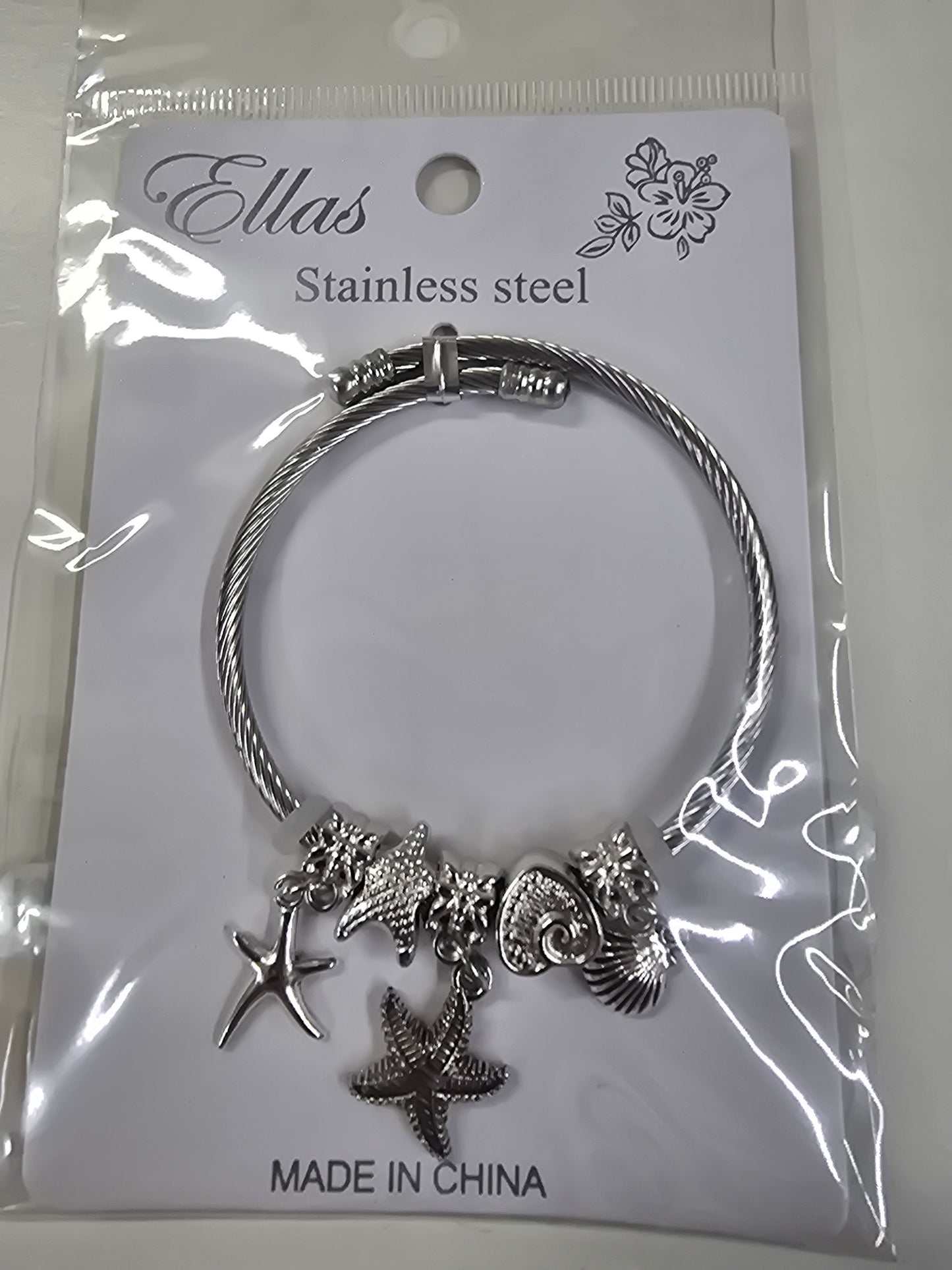 Pulseras con charms ( dijes) de estrella de mar