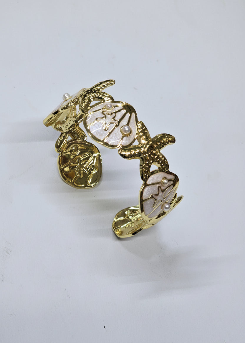 Pulsera en acero inoxidable con baño de oro