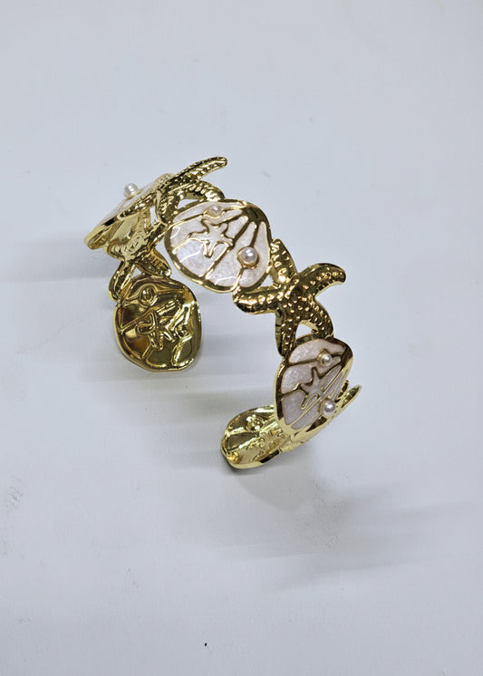 Pulsera en acero inoxidable con baño de oro