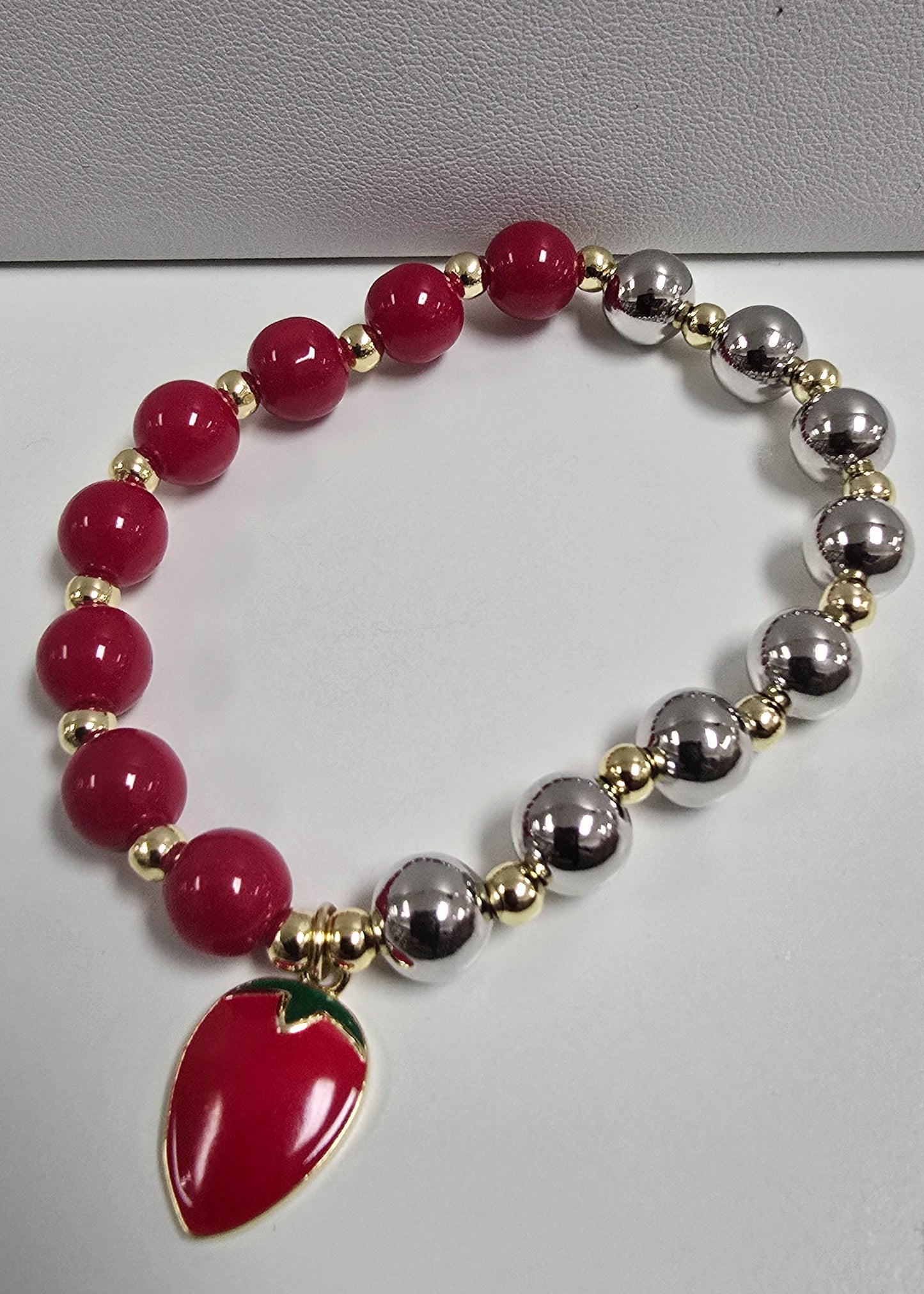 Pulsera de Strawberry en tres tonos