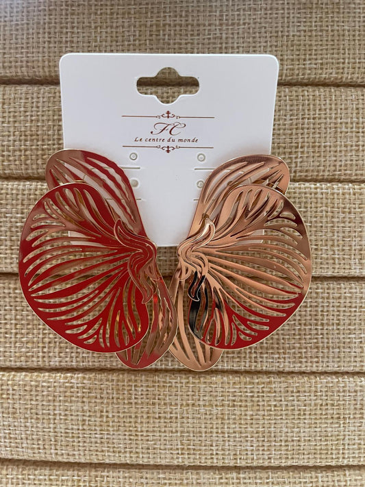 Aretes media flor