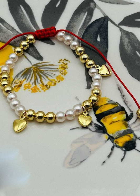 Pulsera perla y corazones