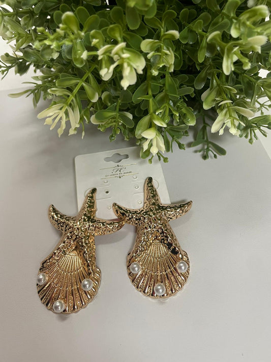 Arete de estrella, concha y perlas largo
