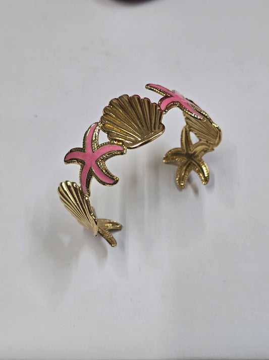 Pulsera en acero inoxidable con baño de oro