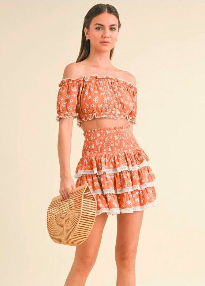WOMEN'S OFF SHOULDER
CROP TOP & ELASTIC WAIST
MINI SKIRT RUFFLE FLORAL