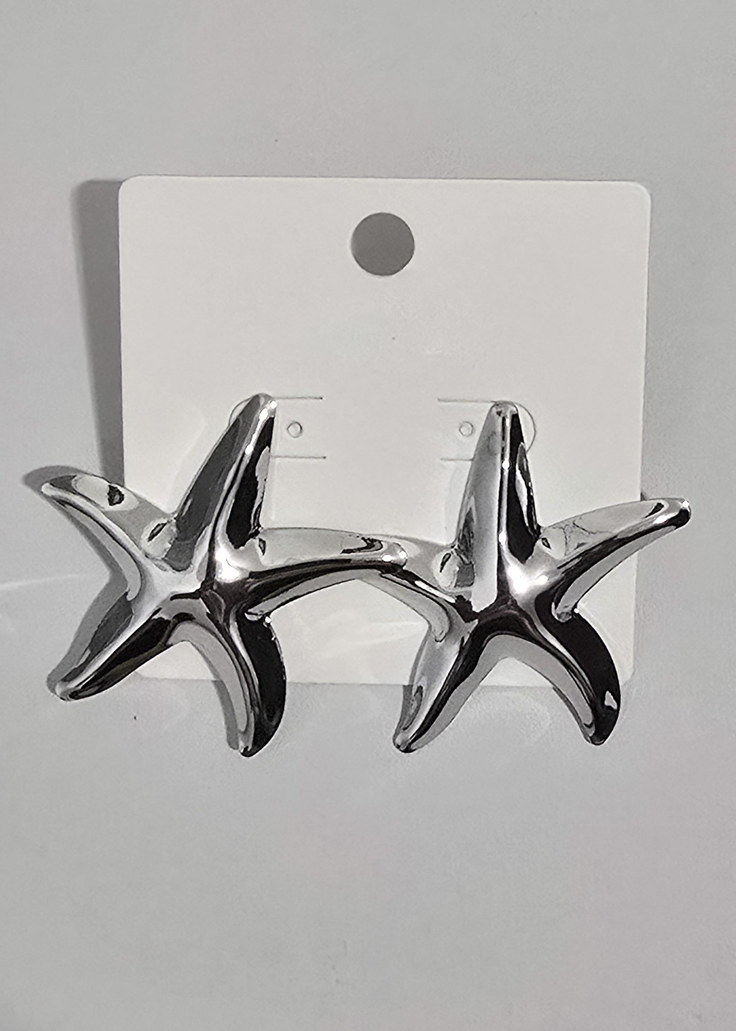 Arete de Estrella de Mar en Metal