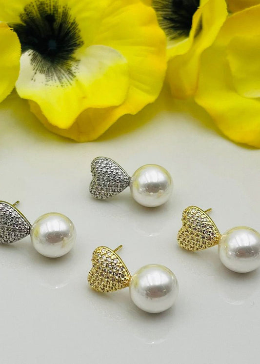 Arete estilo de corazón y colgante se perla