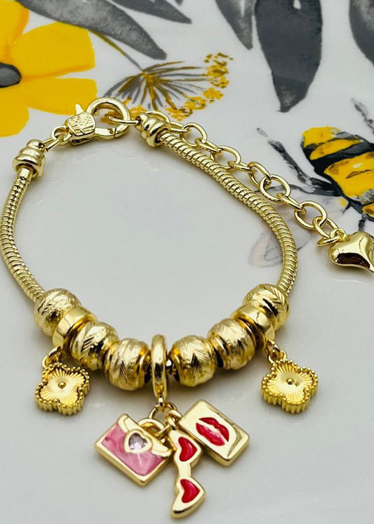Pulsera Gold Plate con varios chams